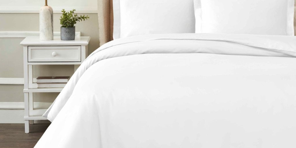 Superior 1200 thread count Egyptian cotton duvet cover set on a made bed