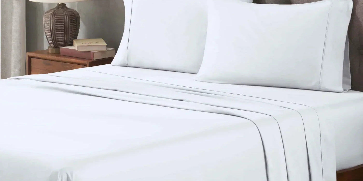 Superior 400 thread count Egyptian cotton sheet set in white on a made bed