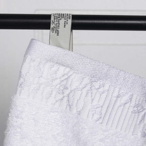 Superior Wisteria Cotton Floral Jacquard Border Hand Towels (Set of 4)