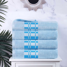 Superior Larissa Cotton 4-Piece Bath Towel Set with Geometric Embroidered Jacquard Border  -Light Blue